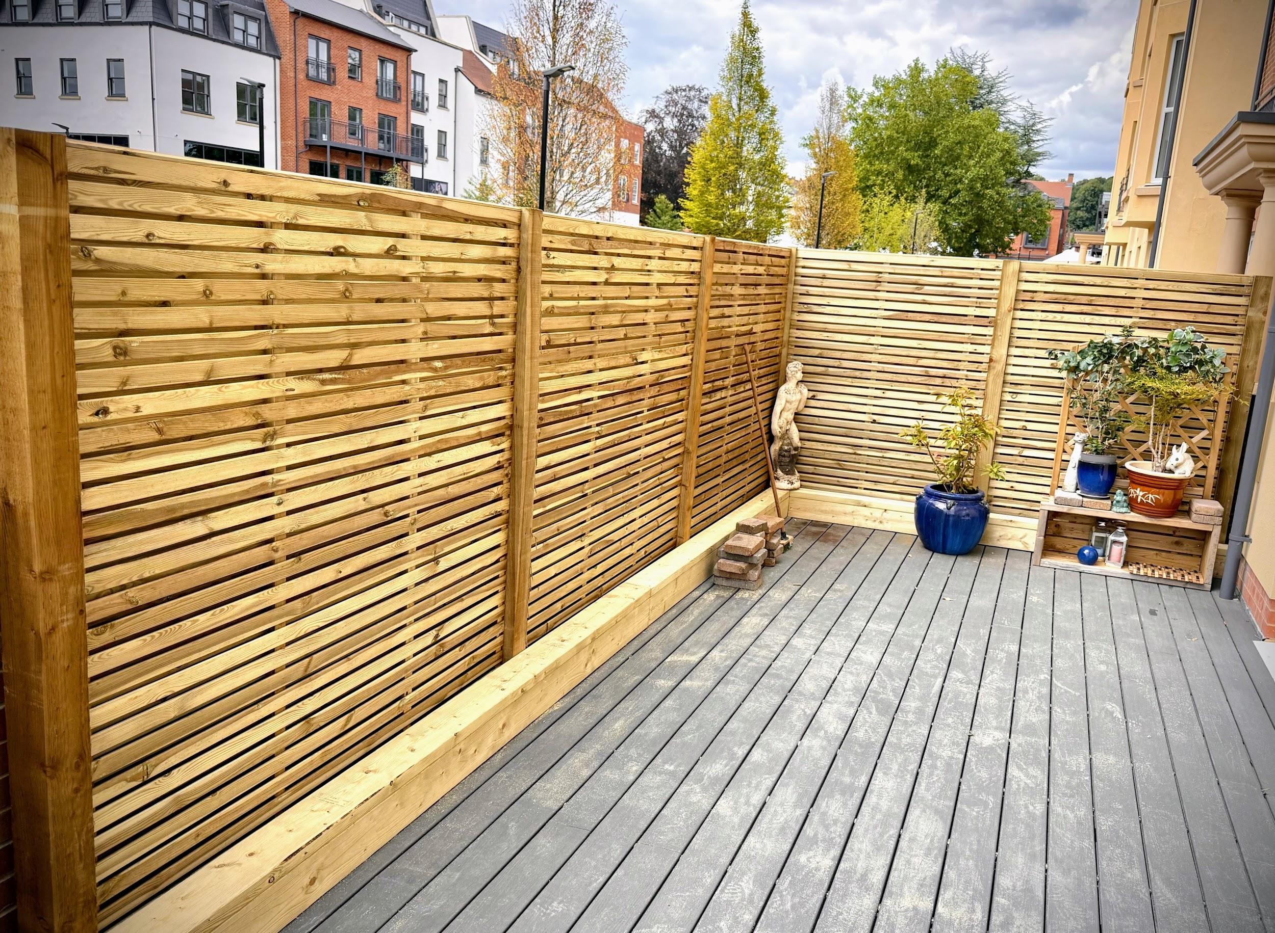 Slatted fencing used as a garden privacy screen